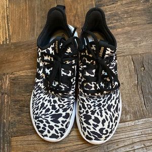 Adidas tennis shoes in animal print. Very clean, worn once.